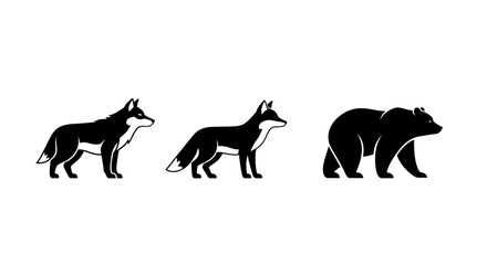 Obraz premium Silhouettes of a fox, a coyote, and a bear standing against a white background