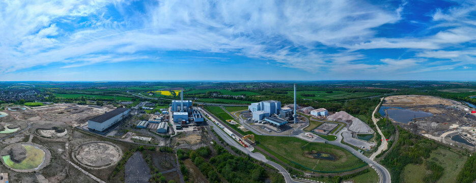 Aerial view of Enfinium Ferrybridge 1 and 2 waste-to-energy facility with industrial buildings and tall chimneys Knottingley, England, United Kingdom.