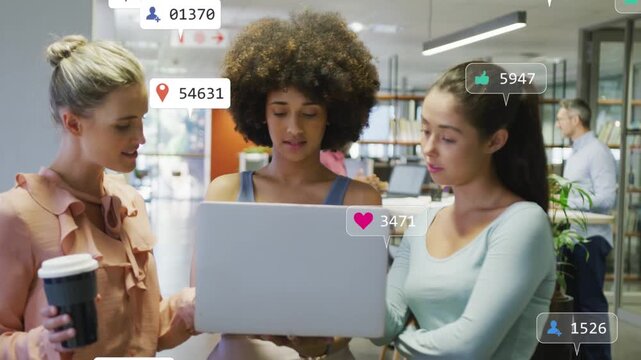 Three women reviewing laptop at work as social icons multiplying across screen sparking stats talk