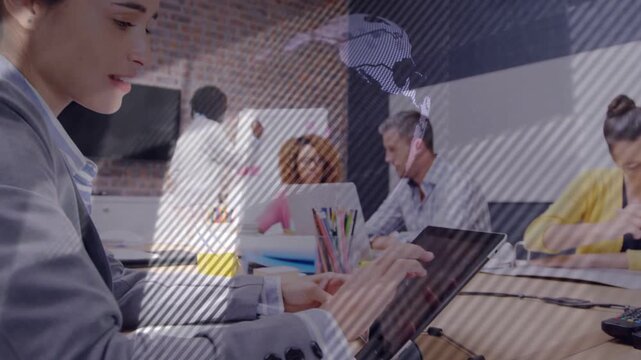 Woman using tablet tapping screen causing animated globe and striped overlays sweeping for business