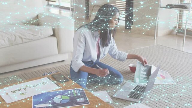 Woman sitting scanning laptop and green report picking, comparing business charts net linking data