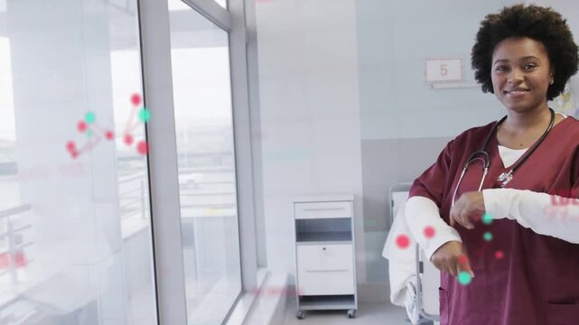 Nurse steth turning as red-teal data drifting across window, folding arms, projecting health calm