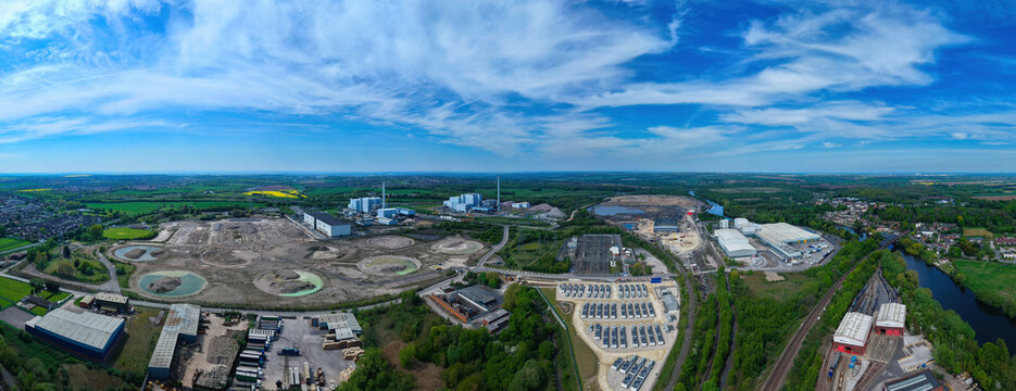 Aerial view of the Battery Energy Storage Systems facility and industrial landscape with a river and railway tracks Knottingley, England, United Kingdom.