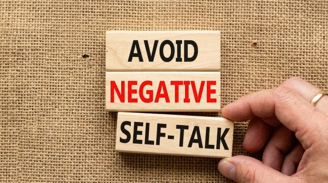 A wooden sign on a burlap background advises people to avoid negative self-talk for better mental well-being and positive thinking.