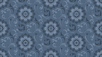 Blue ornamental paisley floral pattern texture for fabric, wallpaper, and graphic design. © Santy