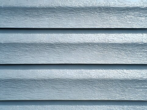 Gray vinyl siding on a house exterior