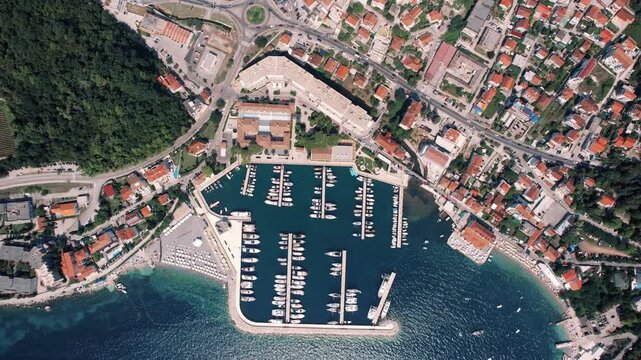 Herceg Novi harbor seaside scene. Drone shot of coastal harbor and beaches