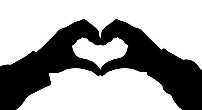Hands making a heart shape with their fingers