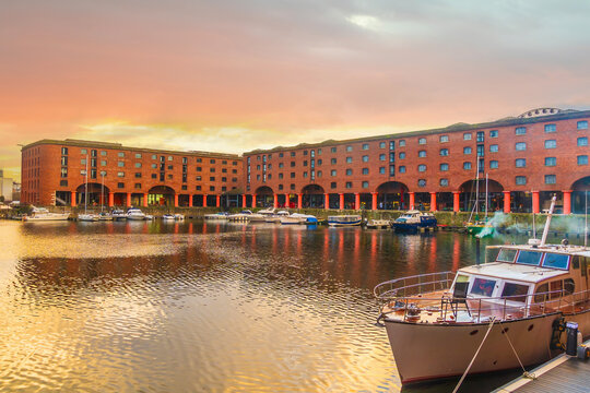 Historic red brick  dock at night with old warehouses in downtown  Liverpool