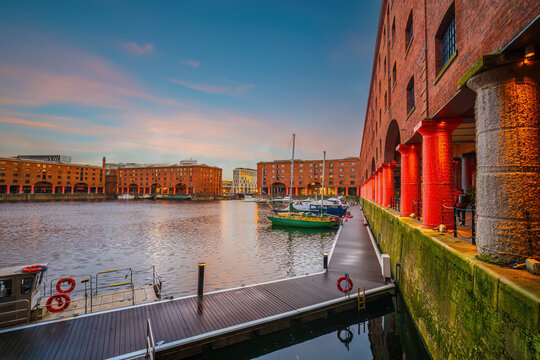Historic red brick  dock at night with old warehouses in downtown  Liverpool