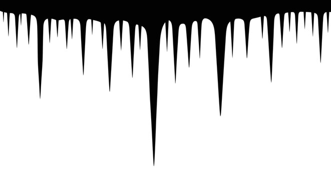 Sharp jagged and dripping black icicles forming a natural border against a stark white background representing cold winter weather and frozen water formations