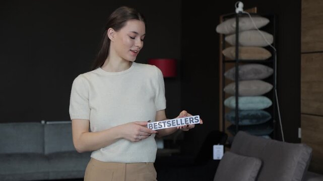 Furniture store seller presenting bestsellers collection