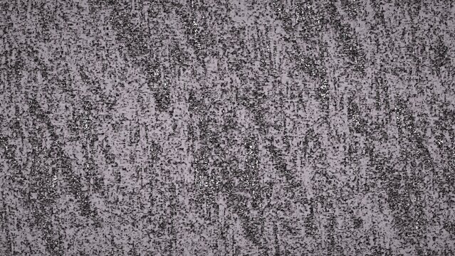Abstract gray textured background with grainy speckled pattern resembling static noise or metallic surface. Perfect for overlays, backgrounds, and digital design projects requiring texture.
