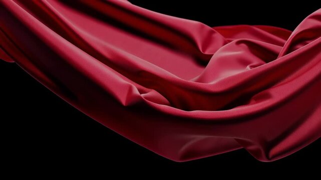 Red silk fabric draped elegantly against a black background texture