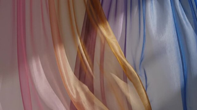 Purple and blue silk waves flow over a black backdrop in this abstract fractal background vector illustration featuring soft light curves and a smooth smoke texture design