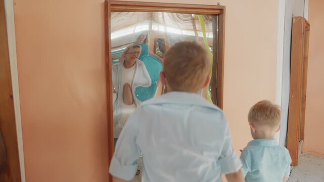 White boys playing with warped mirror, playful weekend park scene, children giggling and making faces, teal dress cameo, reflections stretching and compressing, festival fairground atmosphere, parent