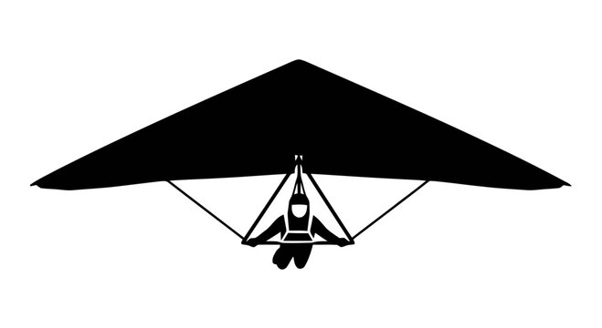 Hang glider in flight silhouette.