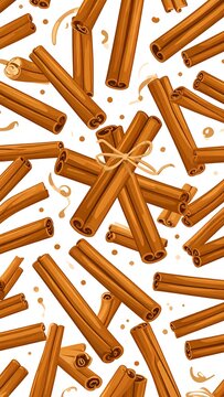 Aromatic cinnamon sticks scattered on white