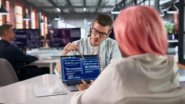 Programmer Writes Clean Code On Computer While Collaborating