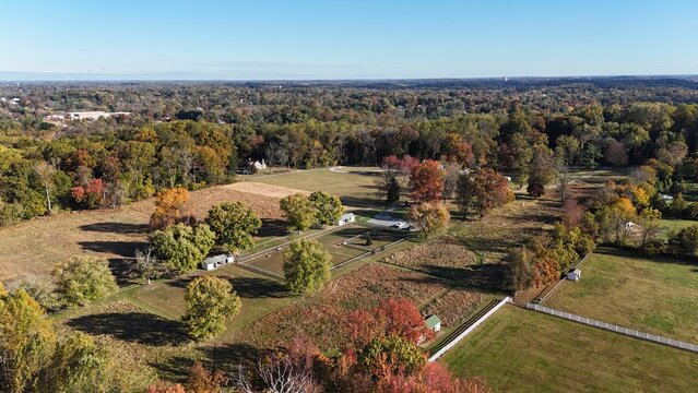 Aerial view of rural farmland and autumn landscape in Garnet Valley, suburb of Philadelphia, Pennsylvania USA