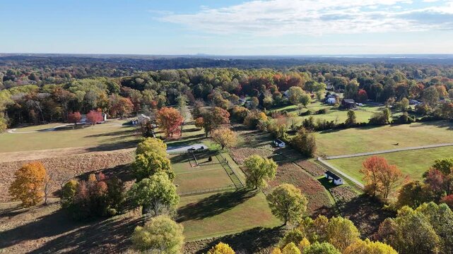 Aerial view of rural farmland and autumn landscape in Garnet Valley, suburb of Philadelphia, Pennsylvania USA