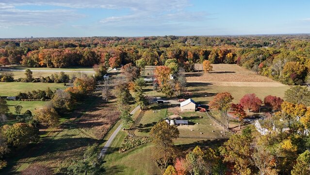 Aerial view of rural farmland and autumn landscape in Garnet Valley, suburb of Philadelphia, Pennsylvania USA