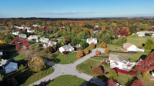 Aerial view of suburban single-family homes with autumn foliage in Garnet Valley, suburb of Philadelphia, Pennsylvania USA