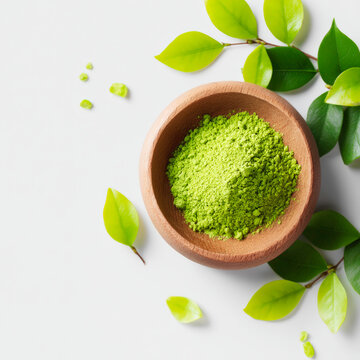 Organic Green Matcha Tea Powder in Rustic Wooden Bowl with Fresh Green Tea Leaves