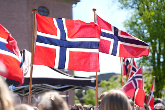 Multiple Norwegian Flags Different Sizes Festive Crowd &mdash; May 17 National Day Parade Celebration Norway Patriotism