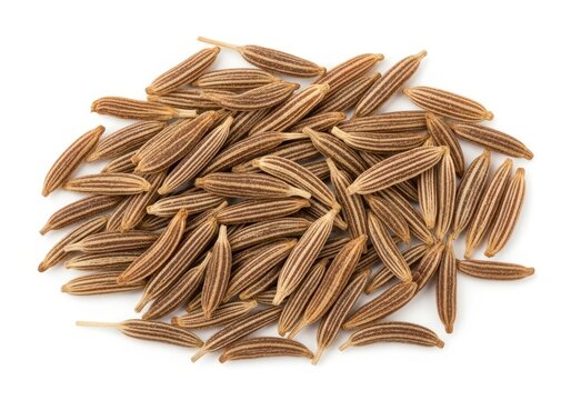 Pile of caraway seeds on a white surface