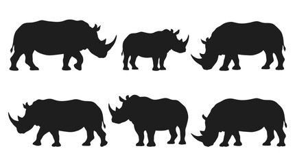 Fototapeta premium Multiple rhinoceros silhouettes in side profile, solid black shapes.