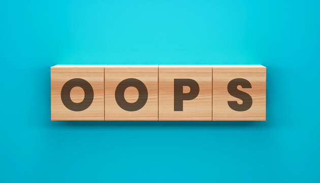 Oops! Block Letters: Four wooden blocks arrange to spell the word OOPS in a simple yet impactful design, ideal for conveying a message of error or a playful mistake.