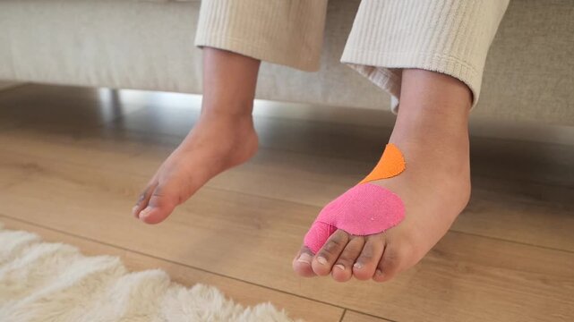 Examining tape on foot for therapy and recovery