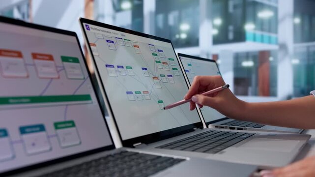 Young Female Business Analyst Reviews Workflow Automation Tasks