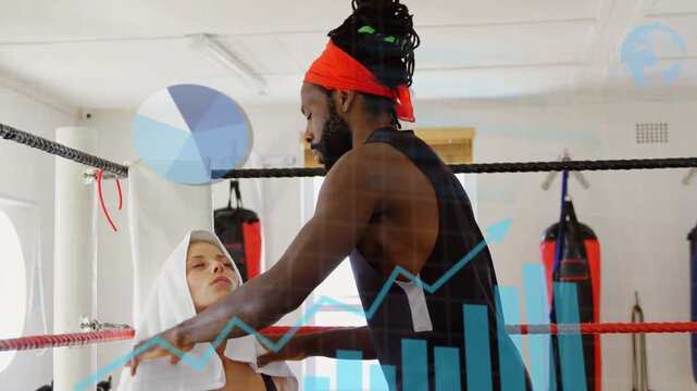 After round trainer placing towel tending boxer checking vitals while sports charts rising over her
