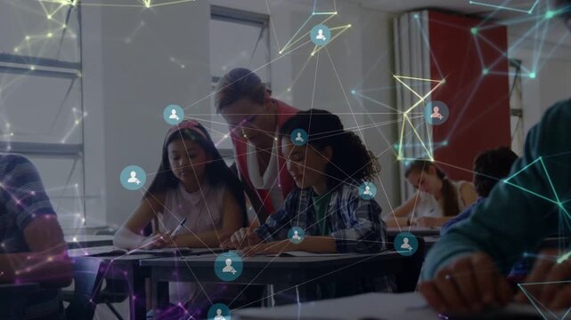 Teacher leaning and pointing helping two pupils writing, net overlay densifying around classroom