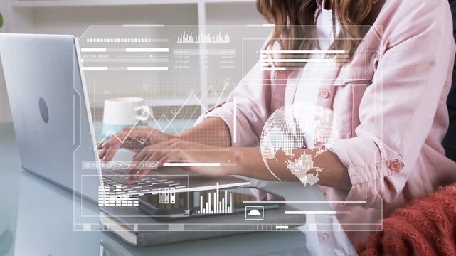 Woman typing at desk, key presses activating HUD with graphs on laptop for technology analytics