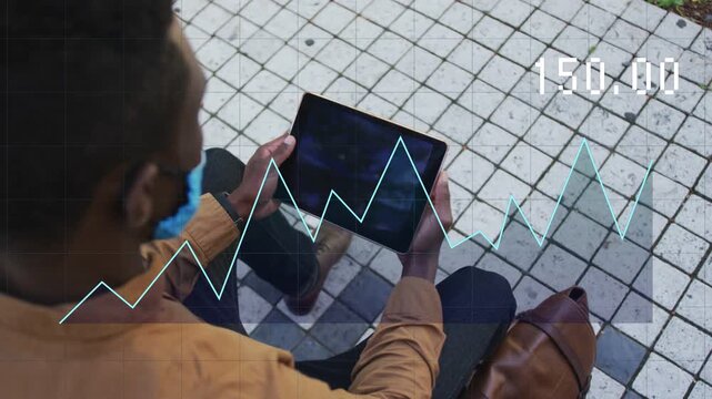 Man holding tablet on bench timestamp updating and driving finance trend graph overlaying lap