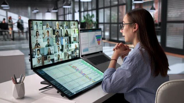 Person Using Laptop During Online Video Conference Meeting