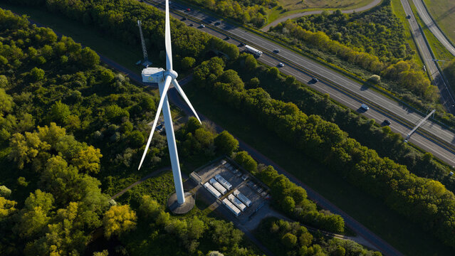 Drone view of a stationary energy storage system near Hellegatsplein wind farm, used for grid balancing, FCR, imbalance control, and renewable power storage.