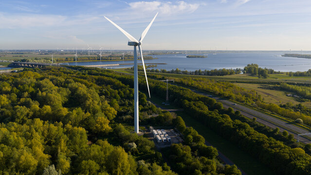 Drone view of a stationary energy storage system near Hellegatsplein wind farm, used for grid balancing, FCR, imbalance control, and renewable power storage.