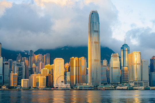 Hong Kong cityscape skyline at morning sunrise sky across Victoria harbor. One of the most tourist attaction in Hong Kong Island, China.