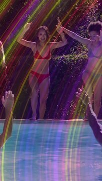 Vertical video: Woman in red bouncing leading pals splashing into pool flare sweeping water fun ads