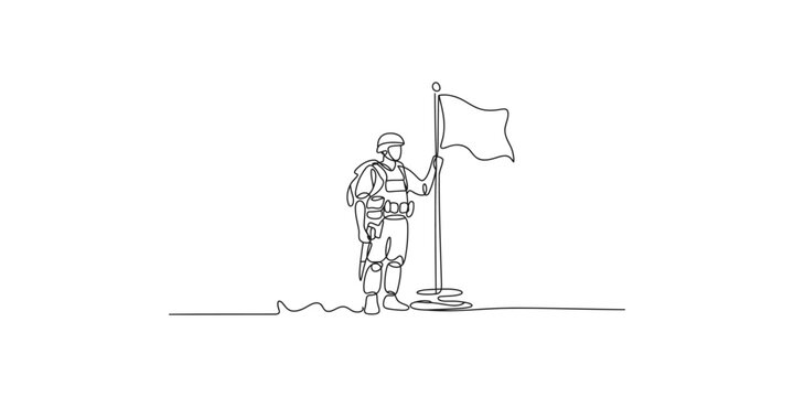 A soldier in military gear holding a flag on a pole outdoors