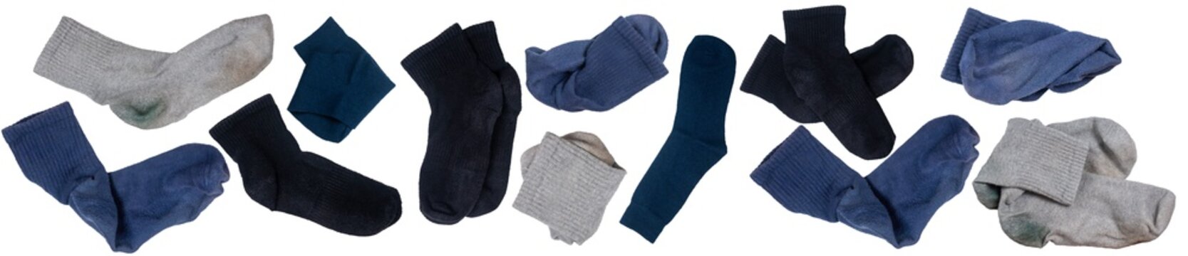 Isolated set of colored worn socks on a white background