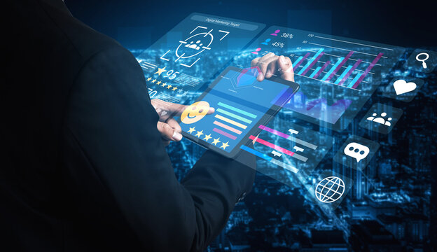 A business professional engages with a digital tablet to analyze data, surrounded by user interface elements like graphs and feedback icons in a futuristic setting. Gantry