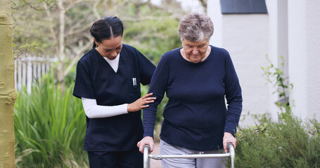 Walker, nurse and help with old woman outdoor for support, physiotherapy and walking aid....