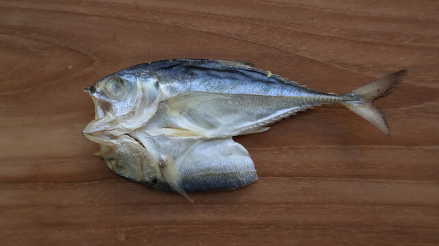 Top View of Salted Scad Fish on Wooden Surface