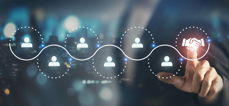 Digital Networking and Partnership Connection. Connecting digital user icons along network path, ending in a handshake icon. Collaboration, partnerships and relationship building in digital ecosystem.