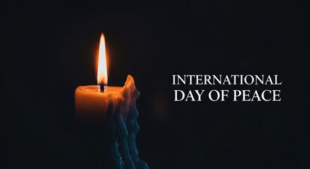 International day of peace a lit candle in the darkness